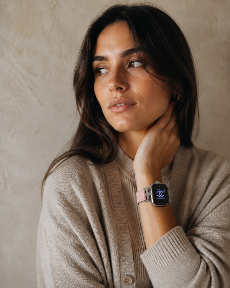 Woman wearing Sophia leather strap smartwatch in cherry blossom pink color