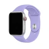 Silver smartwatch with lavender sport band and red digital crown