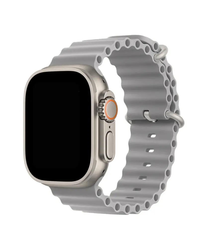Silver titanium smartwatch with concrete gray ocean band and orange digital crown