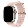 Titanium smartwatch with pink sand ocean wave silicone band and orange accent