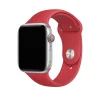 Silver smartwatch with red silicone sport band, digital wearable device