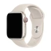White sport band Apple Watch with starlight aluminum case and digital crown