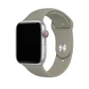 Silver Apple Watch with stone gray sport band and red digital crown