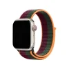 Apple Watch with colorful sport loop band in dark cherry, forest green and orange