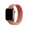 Gold smartwatch with pink and tan striped sport loop band