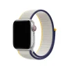 Apple Watch silver aluminum case with navy, cream, and yellow sport loop band