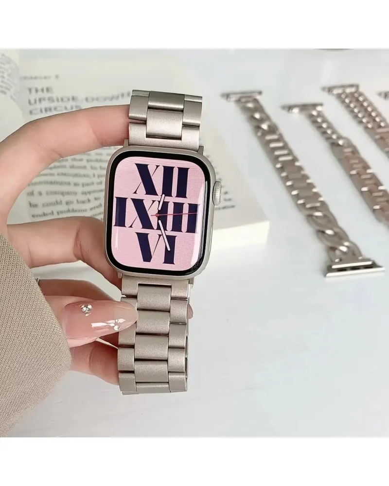 Stainless steel smartwatch with pink Roman numeral dial and metal band