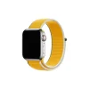 Apple Watch with yellow sport loop band and silver stainless steel case