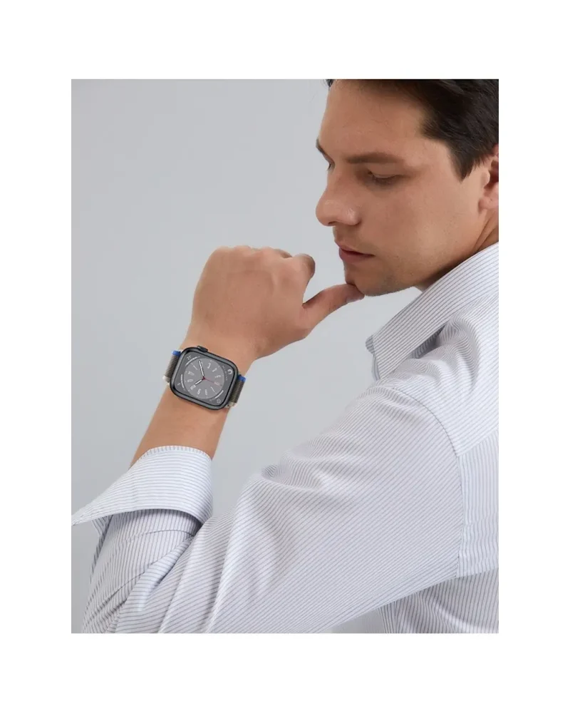 Square face watch with blue-grey nylon loop band on male wrist